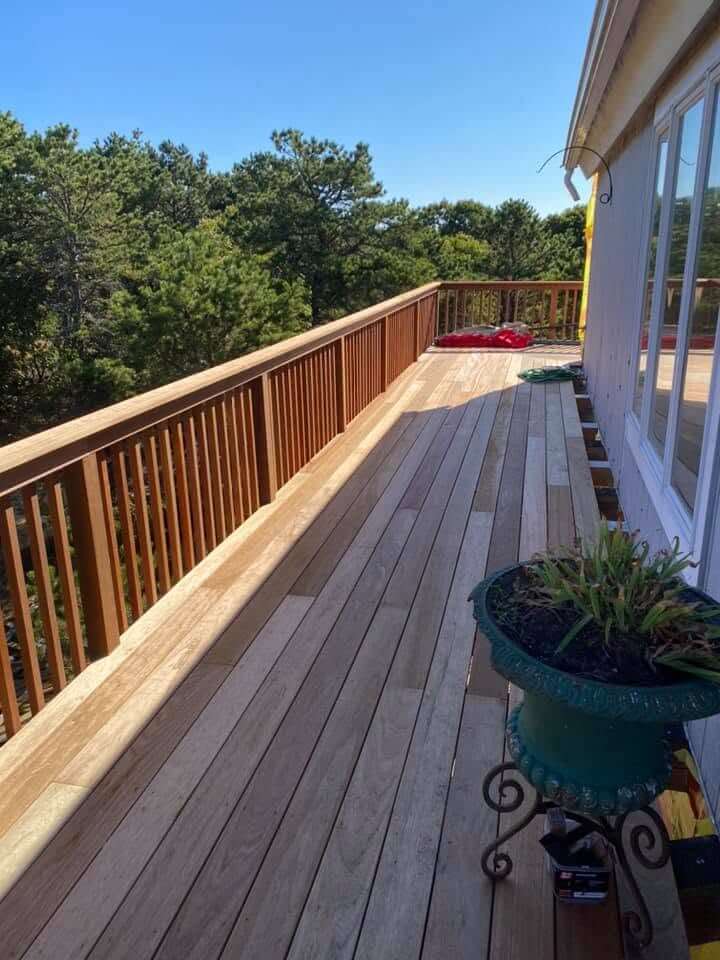 Mahogany deck with custom railing on Cape Cod